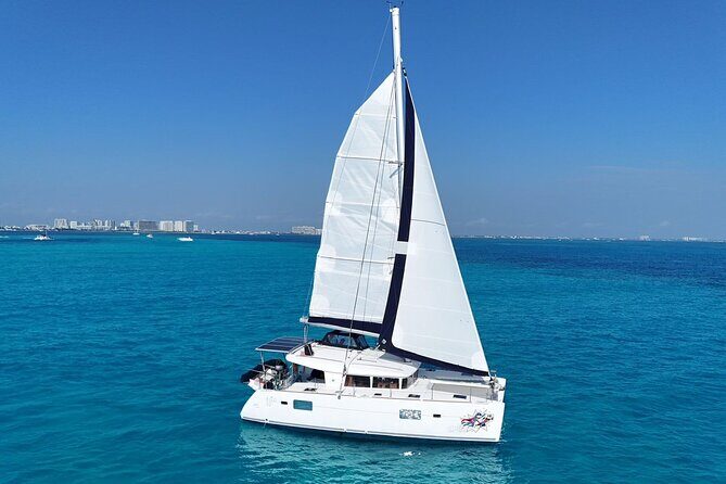 Party at Isla Mujeres Catamaran Open Bar! Half-Day Luxury Tour - Key Points