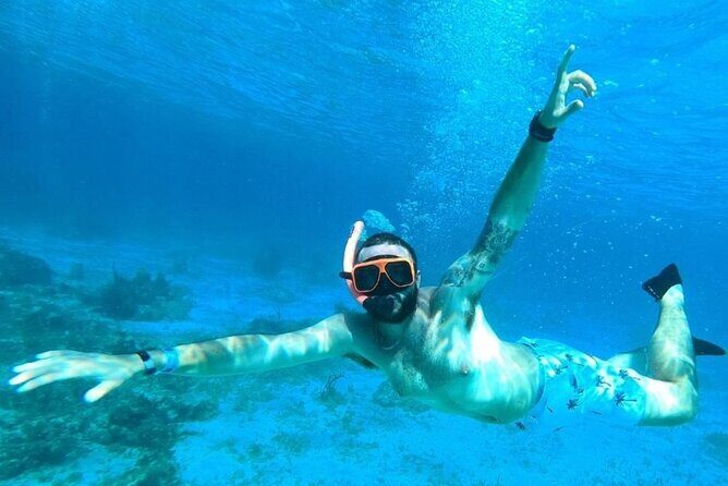 Party Catamaran Cruise with Open Bar and Snorkeling Montego Bay - The Sum Up