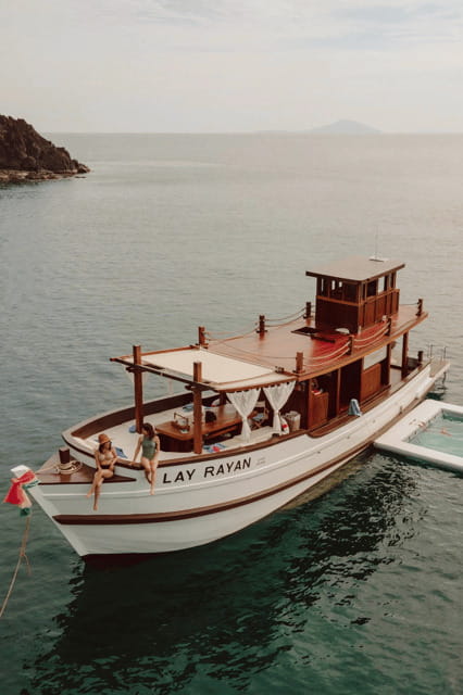 Phuket: Full-Day Luxury Wooden Cruise Adventure & Sunset - Explore the Stunning Coral Island