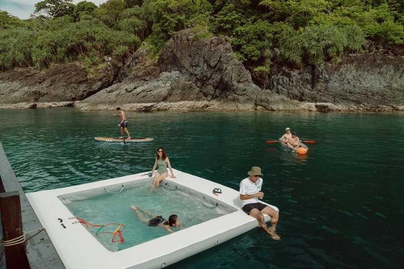 Phuket: Full-Day Luxury Wooden Cruise Adventure & Sunset - Sightseeing at Yanui Beach and Nai Harn Beach
