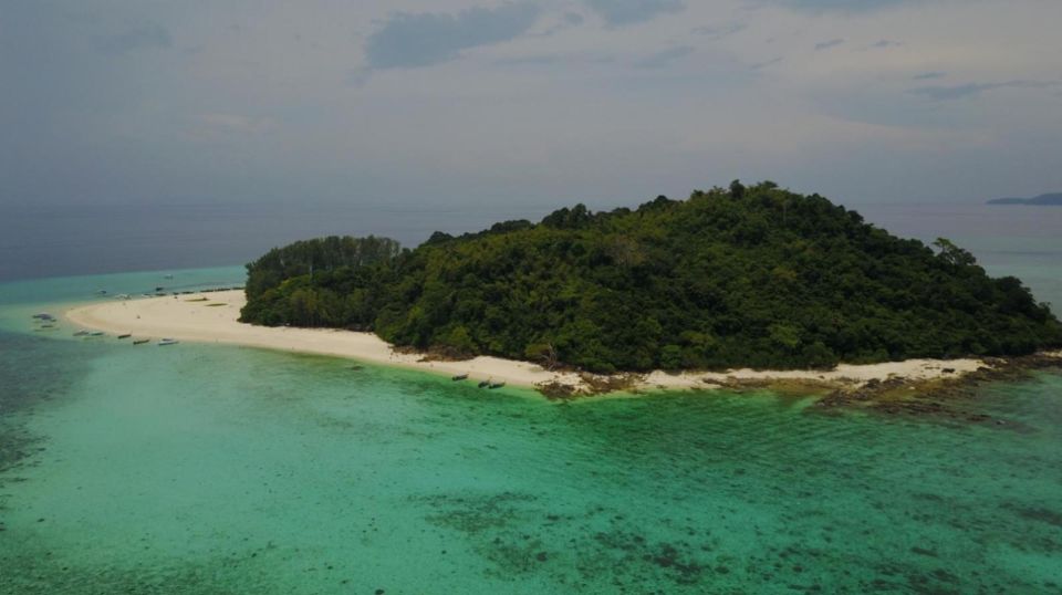 Phuket: Phi Phi Sunrise Boat Tour to Bamboo and Khai Island - Swim at Phi Phi Don