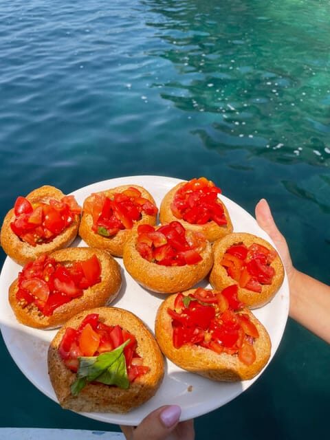 Pirate's outing - Island of Ischia tour with bath and lunch - An Authentic Marine Experience