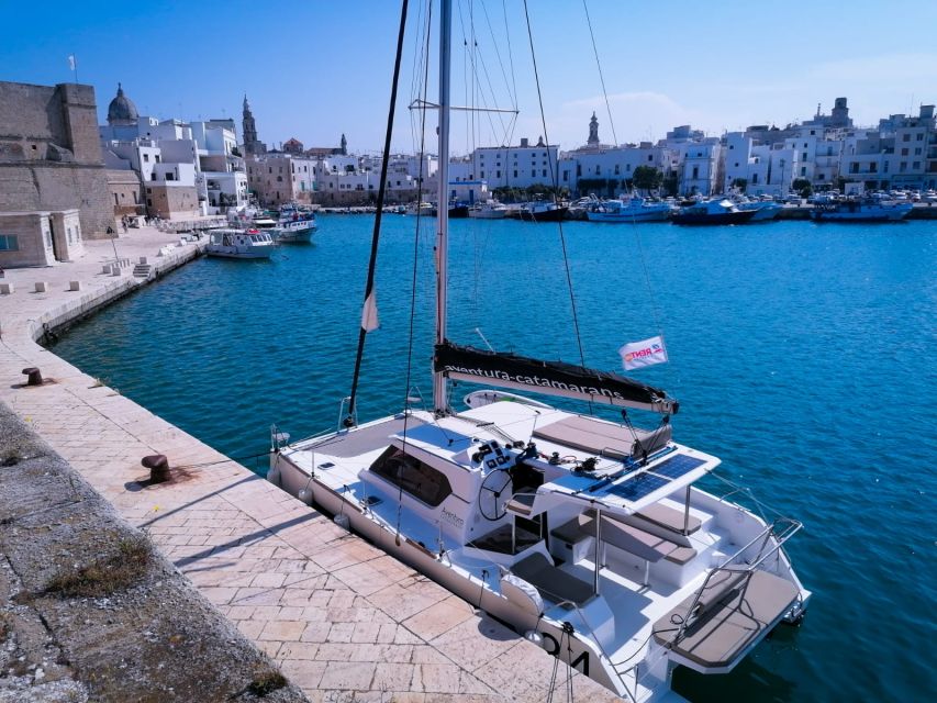 Polignanos Catamaran Trip With Aperitif and Snacks - Booking and Cancellation Policies