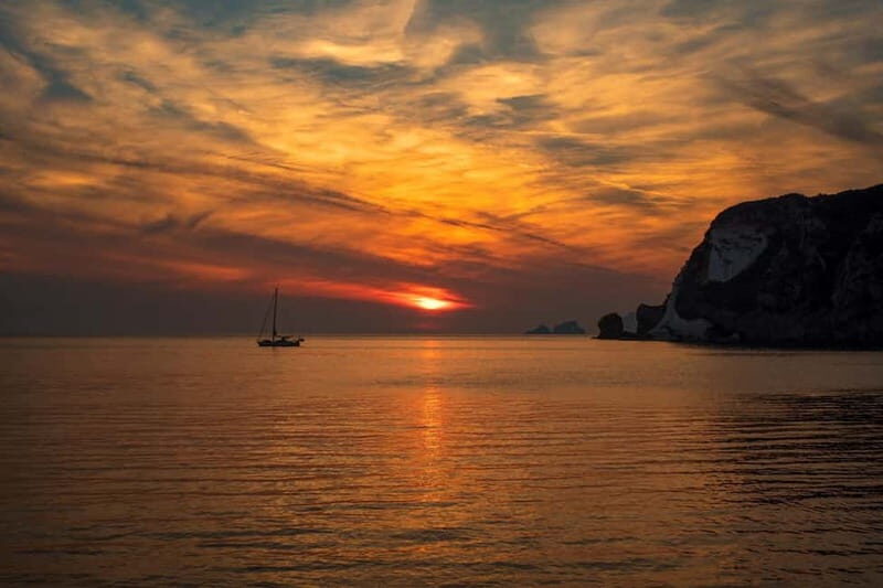 Ponza: Sunset by boat with aperitif and swim at Chiaia di Luna - An Authentic Evening on the Water