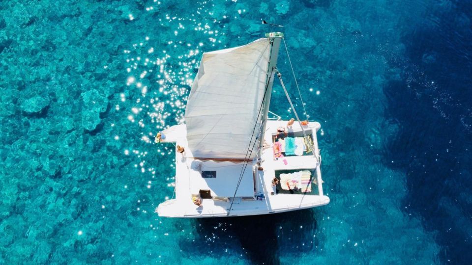 Porto Conte: Half-Day Catamaran Tour With Aperitif - Itinerary Highlights