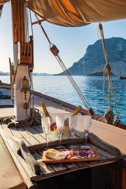 Porto San Paolo: Vintage Cruise Sunset Aperitif to Tavolara - The Itinerary Breakdown  