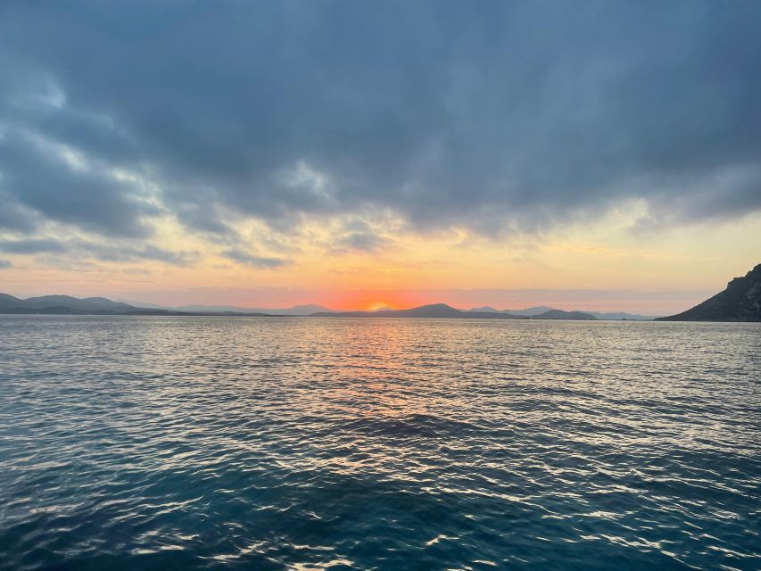 Porto San Paolo: Vintage Cruise Sunset Aperitif to Tavolara - Memorable Moments