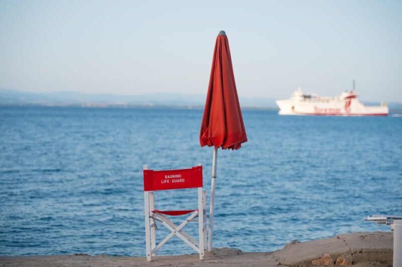 Porto Santo Stefano: La Caletta beach club - Cocktails under the umbrella - What To Expect: A Day of Calm and Scenic Views