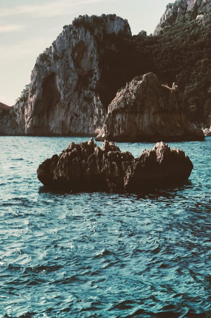 Positano: Capri and Blue Grotto Shared Boat Tour with Drinks - Frequently Asked Questions