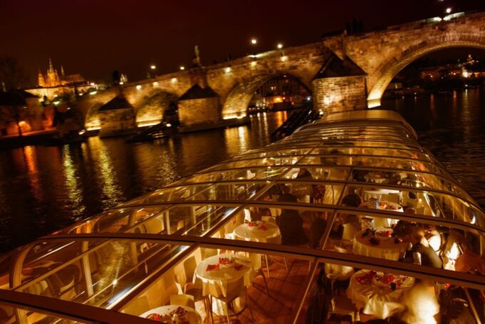 Prague: Sightseeing Dinner Cruise on Open-Top Glass Boat - Getting to the Cruise Location