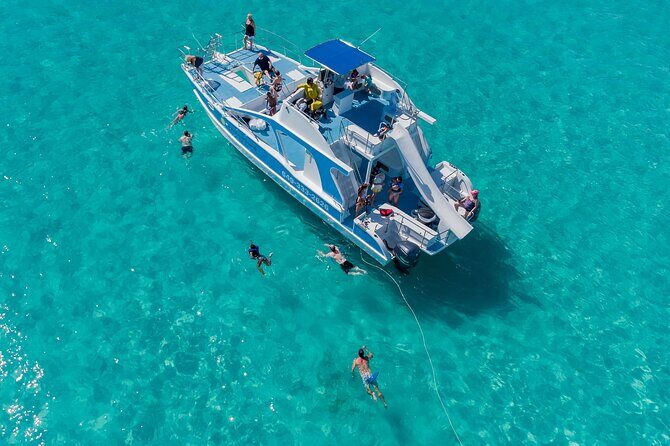 Private 4-Hour Catamaran Tour from Providenciales in Turks and Caicos - Key Points