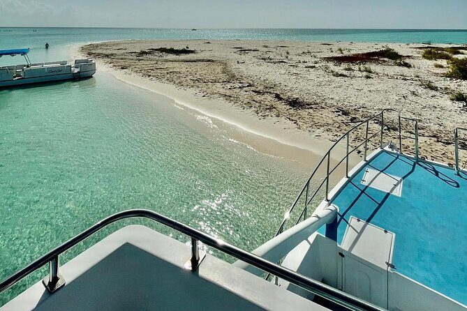 Private 7-Hour Catamaran Tour in Turks and Caicos - Half Moon Bay: Sun, Sand, and Rum Punch