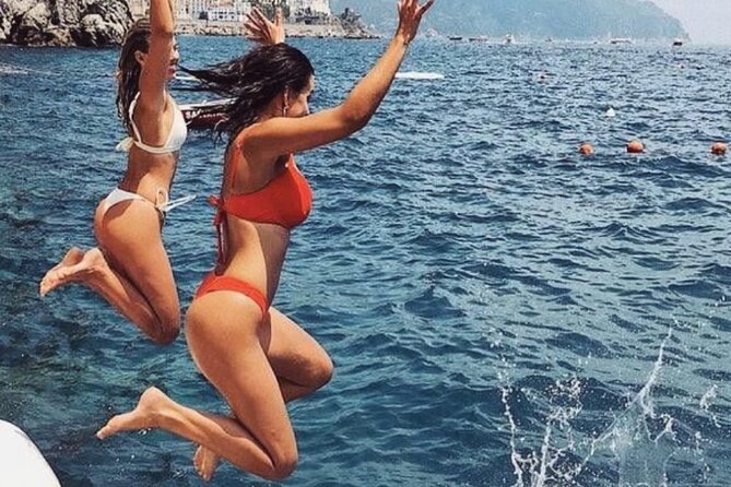 Private Boat Tour From Positano to the Amalfi Coast With Drinks - Scenic Views and Photography
