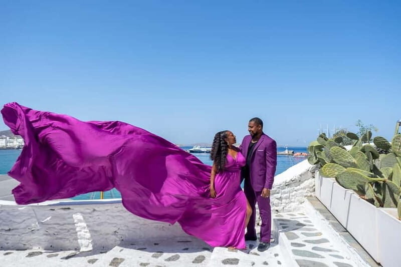 Private Flying Dress Photoshoot Santorini With Pickup - The Sum Up