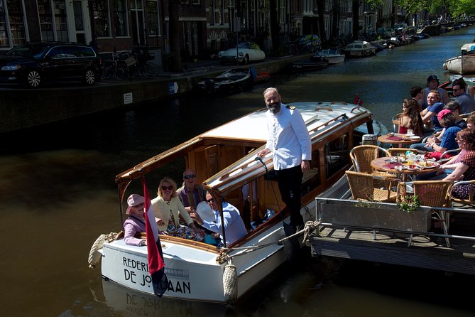 Private Guided Historic Amsterdam Canal Cruise in a Salon Boat - Overview of the Tour