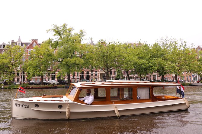 Private Guided Historic Amsterdam Canal Cruise in a Salon Boat - Cultural and Historical Insights
