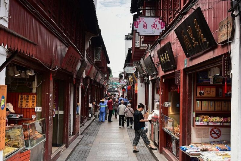 Private Half -Day Tour to Qibao Ancient Water Town - Experience Highlights