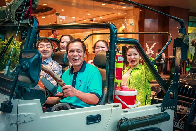 Private Jeep Tour Saigon by Night: Foodie & City Tour - Bustling Flower Market Exploration