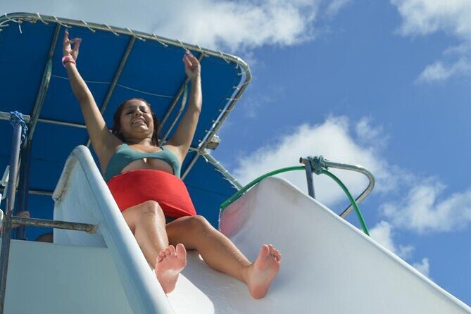Private Party Boat with Slide and chicken skewers at Punta Cana - Authentic Traveler Perspectives