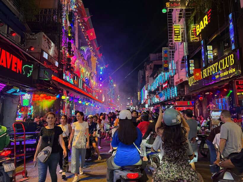 Private Saigon Vespa Adventure: Ho Chi Minh City Street Food - Visiting Iconic Sights in Ho Chi Minh City