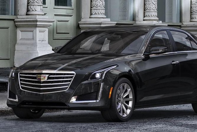 Private Shuttle Houston to Galveston for Up to 14 Passengers - Sum Up