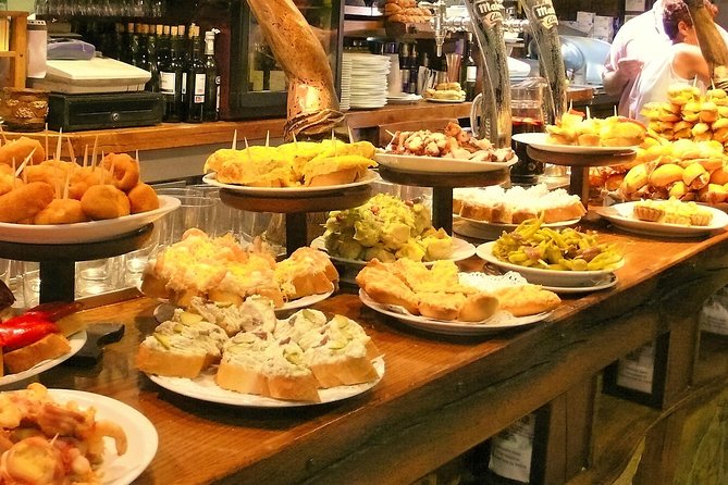 Private Tapas Walking Tour in Barcelona Modernist Area With Dinner Included - Tasting Menu and Specialties