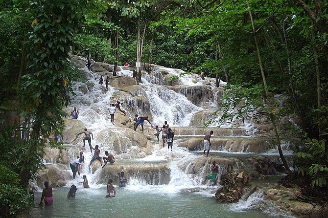Private Tour From Ocho Rios To Dunn's River Falls Tubing and Shopping - White River Tubing: A Splash of Adventure