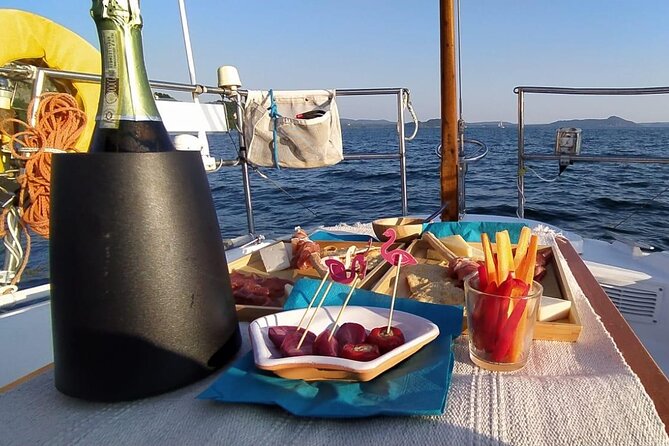 Private Tour on a Sailing Boat on Lake Maggiore With Aperitif and Music - Boat and Sailing Experience
