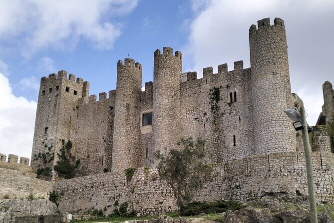 Private Transfer Porto to Lisbon with Nazaré and Óbidos Stops - The Medieval Charm of Óbidos