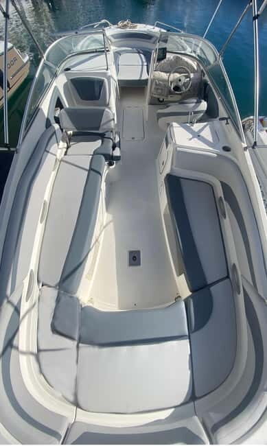Puerto Banús: Floky Boat Cruise with Snorkeling & Paddle SUP - The Sum Up