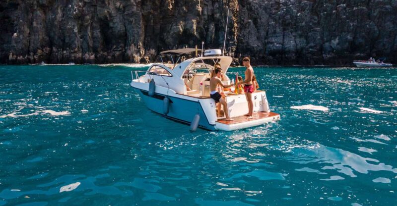 Puerto Colón: Coastal Boat Cruise With Swimming and Snacks - Experience Highlights