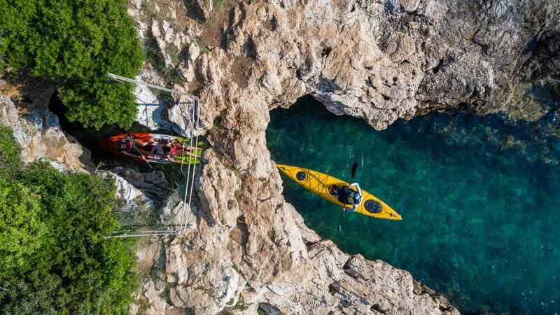 Pula: Islands, cliffs, cave, canyon, kayak tour, snorkeling - Key Points