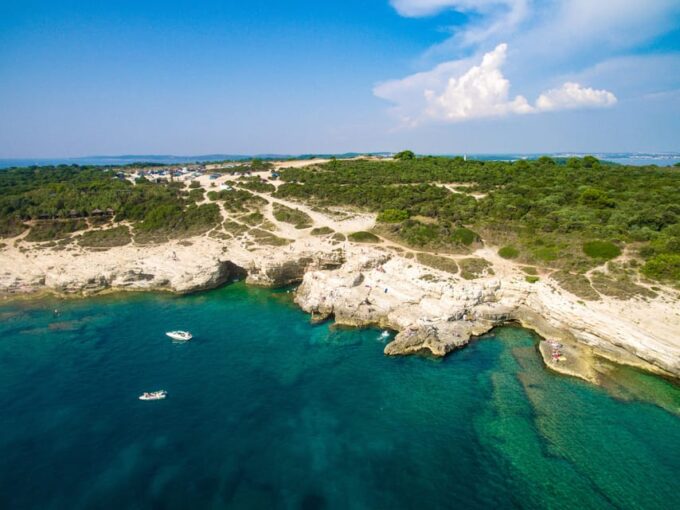 Pula: Kamenjak Bike Tour With Blue Cave and Cliffs Visit - Scenic Views and Swimming