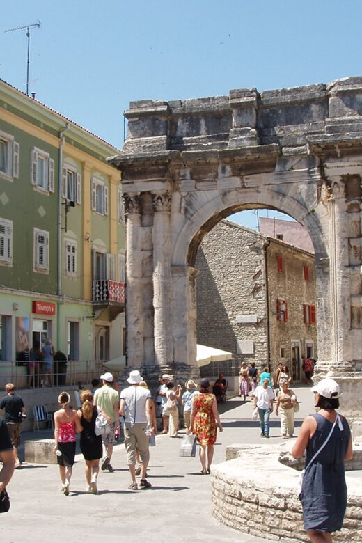 Pula: Old Town Walking Tour for Foodies with Dinner and Wine - Exploring Pulas Roman Heritage and Its Culinary Secrets