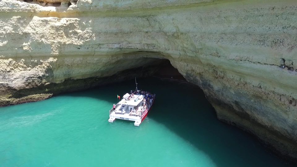 Quarteira: Benagil Cave Guided Catamaran Day Cruise & Drink - Sail to Benagil Cave