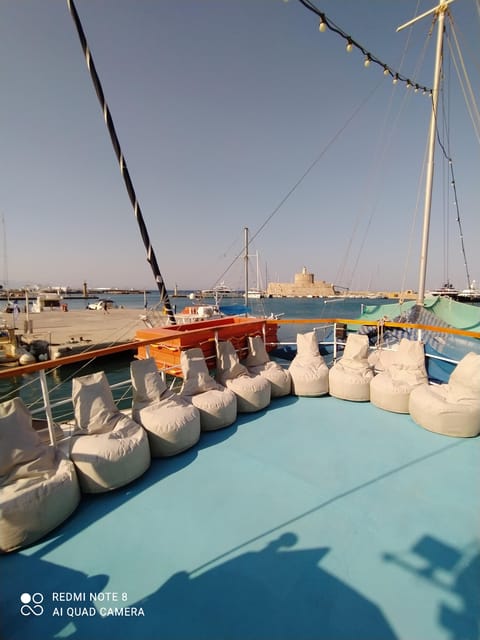 Rhodes: Sunset Cruise to Kallithea with Drinks and Snacks - The Experience in Detail