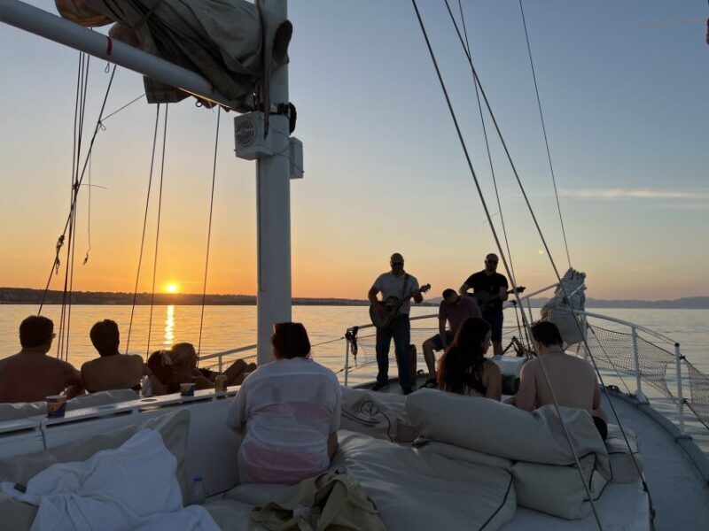 Rhodes: Sunset Cruise w/ Gourmet Buffet, Drinks & Live Music - FAQs