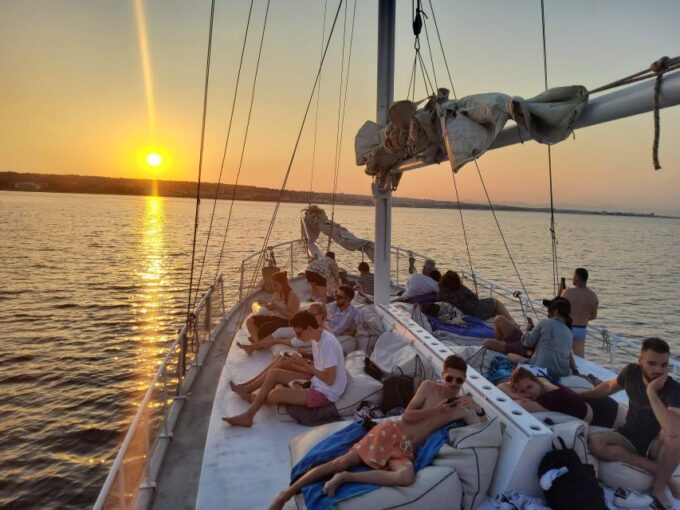 Rhodes: Sunset Cruise W/ Gourmet Buffet, Drinks & Live Music - Frequently Asked Questions