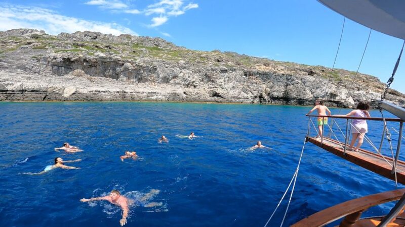 Rhodes Town: Sunset Boat Cruise With Drinks & Snacks - Scenic Views and Highlights