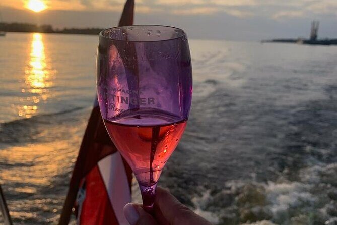 Riga: Evening or Sunset Boat Tour with Drink and Audio Guide - The Experience in Detail: What to Expect