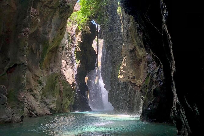 River Trekking at Kourtaliotis Gorge Waterfalls - Trekking Through the River
