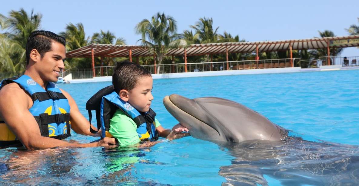 Riviera Maya: Dolphin Encounter With Beach Club Access - Frequently Asked Questions