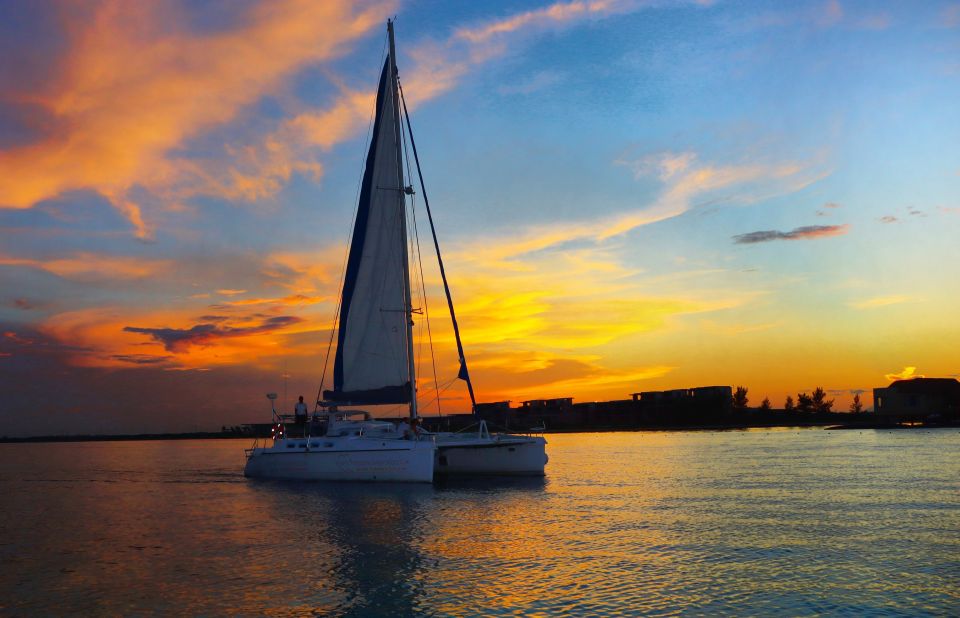 Riviera Maya: Sunset Cruise With Beach Dinner and Open Bar - Key Points
