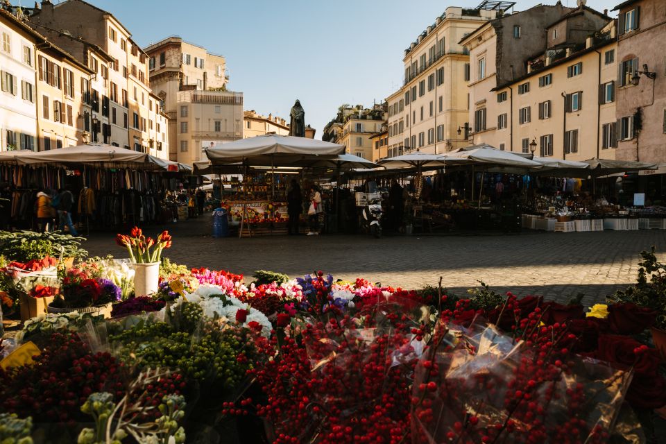 Rome Highlights: Fountains, Squares and More - Admiring Berninis Fountain