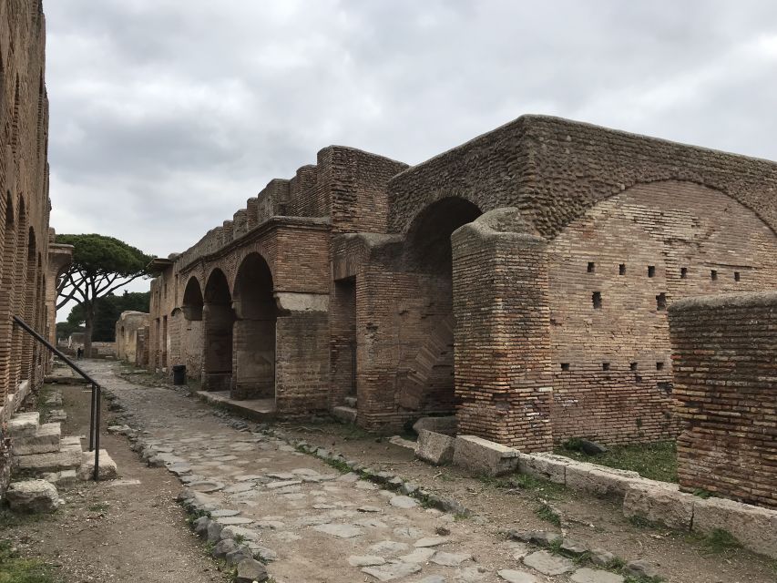 Rome: Ostia Antica Private Van Tour With an Archaeologist - Walking the Decumanus Maximus