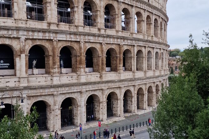 Rome Panoramic Private Tour: Highlights of Rome Driving and Walking Tour - Tour Highlights: Colosseum