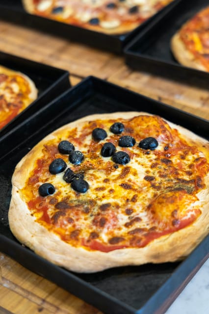 Rome: Pizza & Tiramisu Cooking Class With Meal and Drink - Cooking Instruction