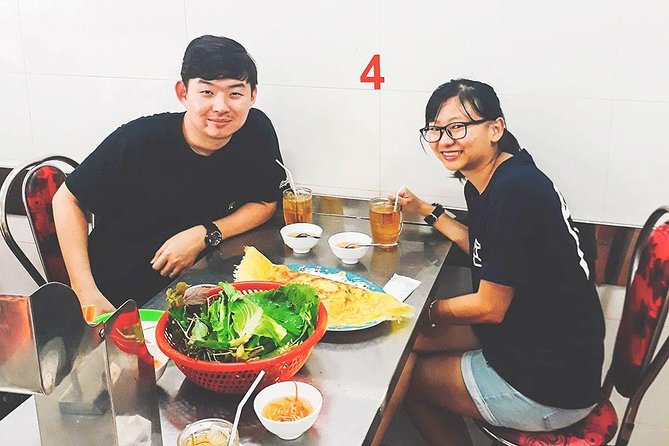 Saigon Afternoon Unseen Street Food by Scooter | Opt: Ao Dai Rider - Reviews and Booking