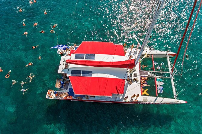 Sailing Catamaran Cruise in Santorini With BBQ, Drinks and Transfer - Inclusions and Amenities
