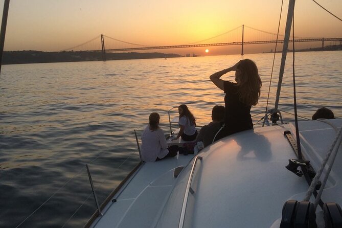 Sailing Catamaran Sunset Group Cruise With Welcome Drink - Meeting and Pickup